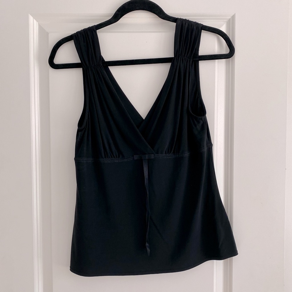 - Tahari top